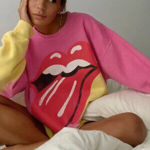 Urban Outfitters Rollingstones pink and yellow crewneck sweatshirt size medium